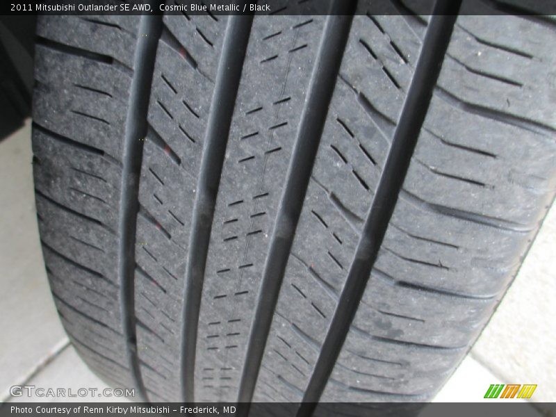Cosmic Blue Metallic / Black 2011 Mitsubishi Outlander SE AWD