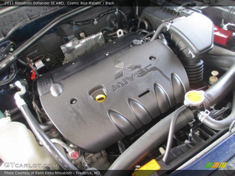 Cosmic Blue Metallic / Black 2011 Mitsubishi Outlander SE AWD