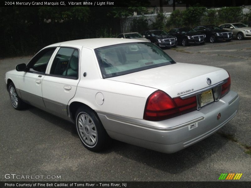 Vibrant White / Light Flint 2004 Mercury Grand Marquis GS