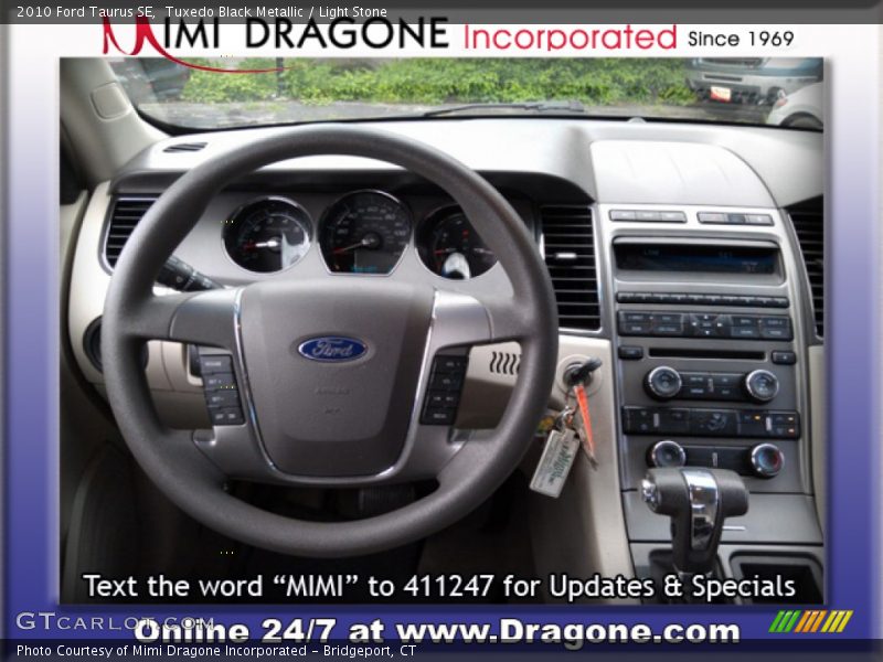 Tuxedo Black Metallic / Light Stone 2010 Ford Taurus SE