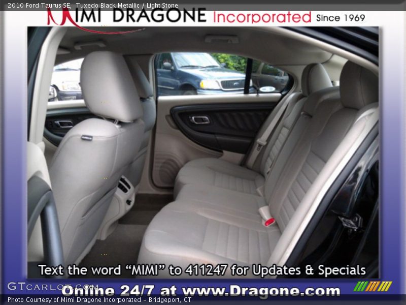 Tuxedo Black Metallic / Light Stone 2010 Ford Taurus SE