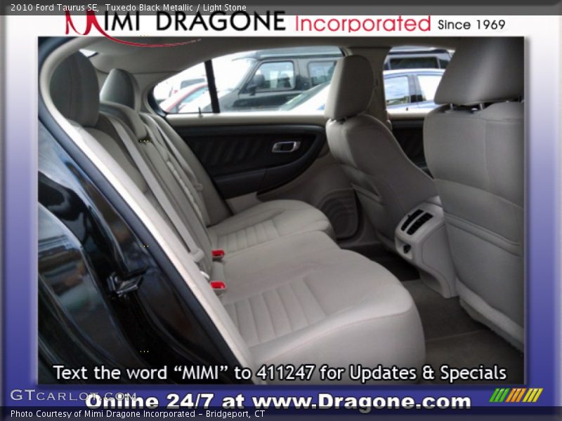 Tuxedo Black Metallic / Light Stone 2010 Ford Taurus SE