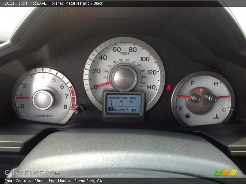 Polished Metal Metallic / Black 2011 Honda Pilot EX-L
