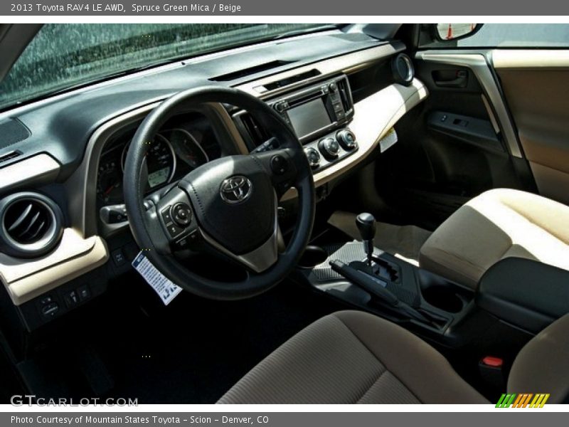 Spruce Green Mica / Beige 2013 Toyota RAV4 LE AWD