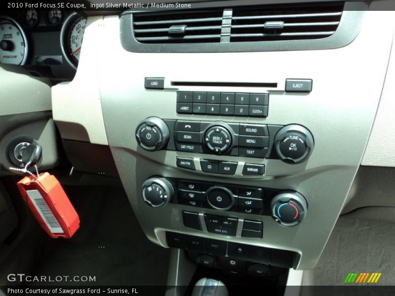 Ingot Silver Metallic / Medium Stone 2010 Ford Focus SE Coupe