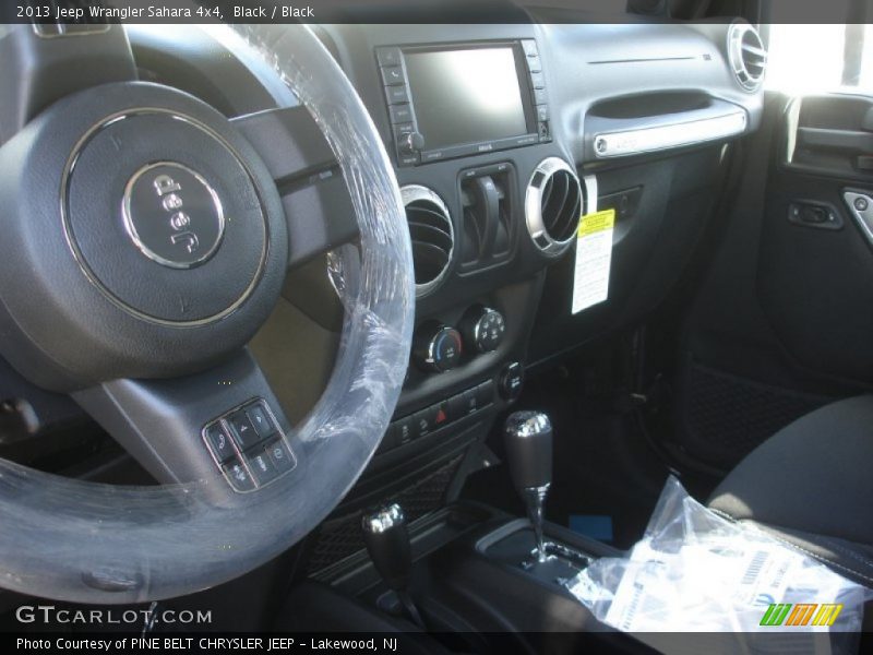 Black / Black 2013 Jeep Wrangler Sahara 4x4