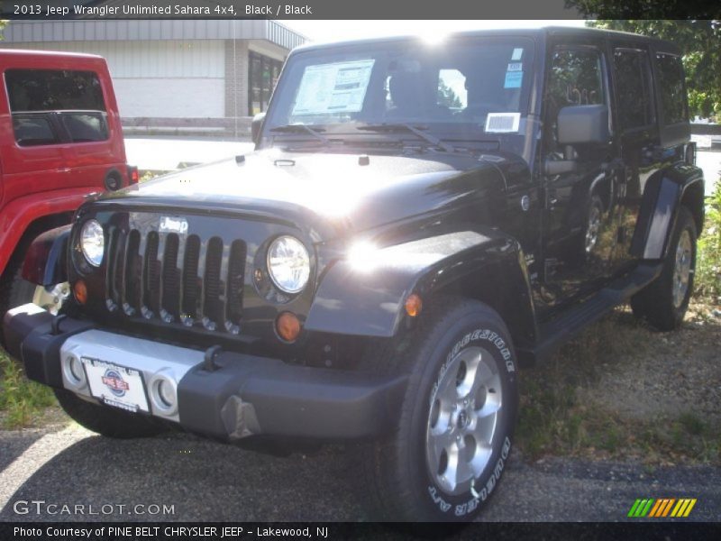 Black / Black 2013 Jeep Wrangler Unlimited Sahara 4x4