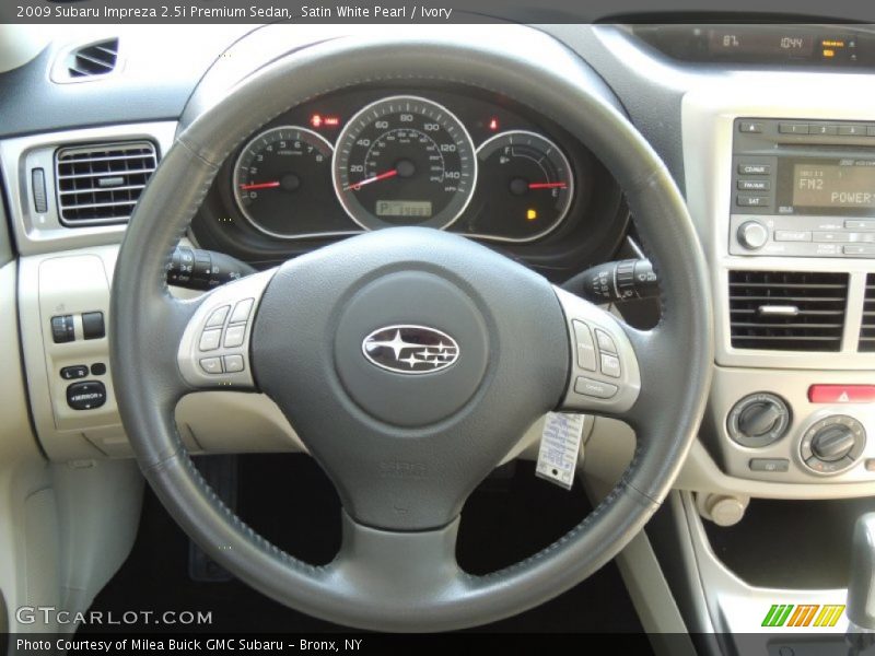 Satin White Pearl / Ivory 2009 Subaru Impreza 2.5i Premium Sedan