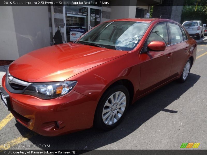 Paprika Red Pearl / Ivory 2010 Subaru Impreza 2.5i Premium Sedan
