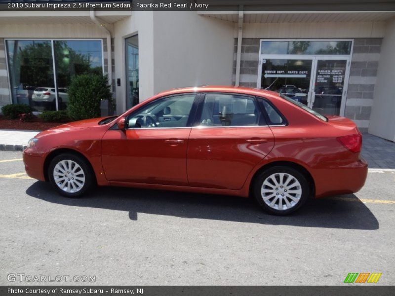 Paprika Red Pearl / Ivory 2010 Subaru Impreza 2.5i Premium Sedan