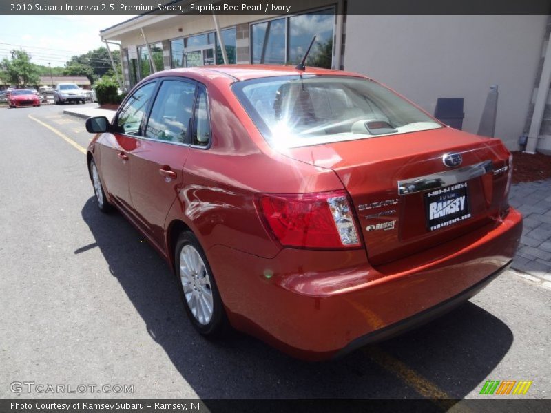 Paprika Red Pearl / Ivory 2010 Subaru Impreza 2.5i Premium Sedan