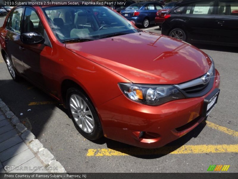 Paprika Red Pearl / Ivory 2010 Subaru Impreza 2.5i Premium Sedan