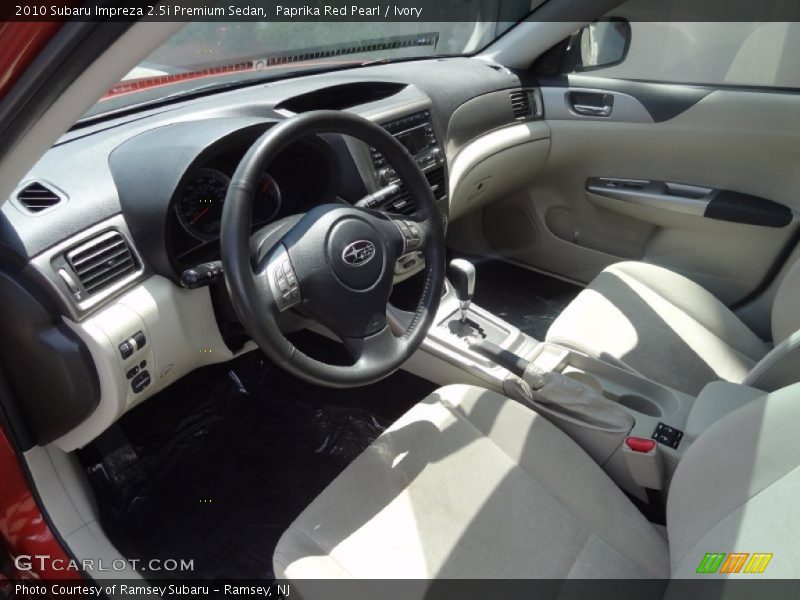Paprika Red Pearl / Ivory 2010 Subaru Impreza 2.5i Premium Sedan