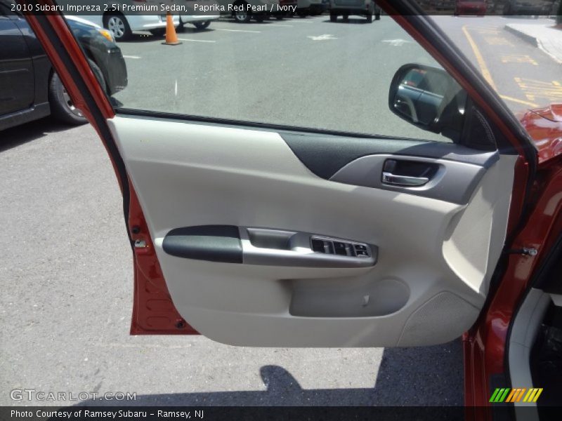 Paprika Red Pearl / Ivory 2010 Subaru Impreza 2.5i Premium Sedan