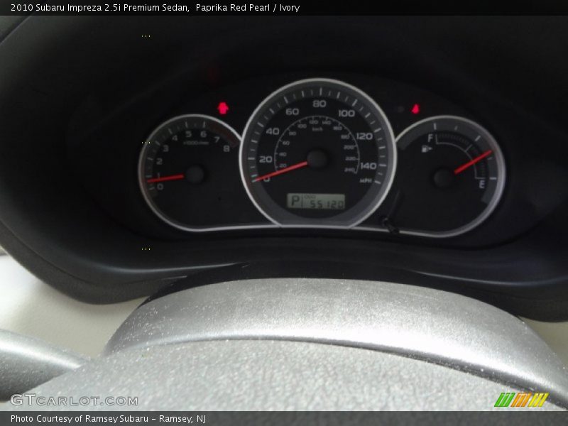 Paprika Red Pearl / Ivory 2010 Subaru Impreza 2.5i Premium Sedan