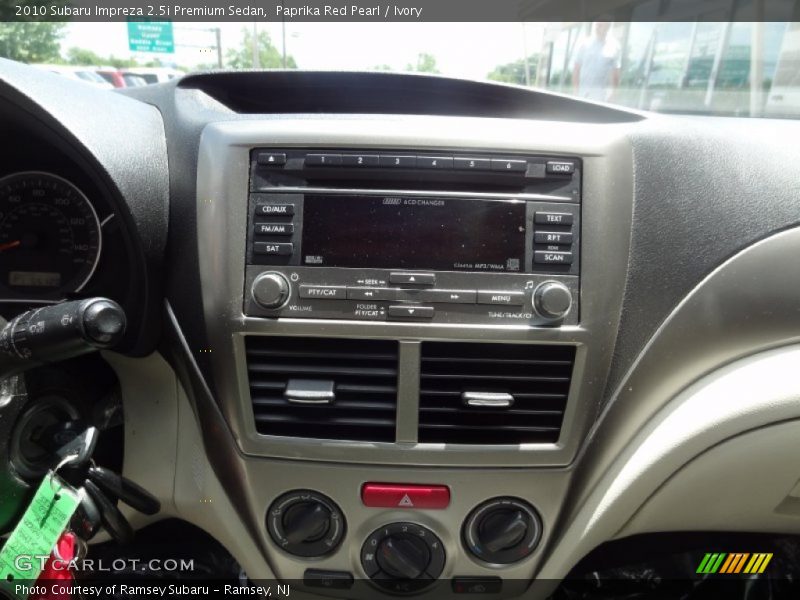 Paprika Red Pearl / Ivory 2010 Subaru Impreza 2.5i Premium Sedan