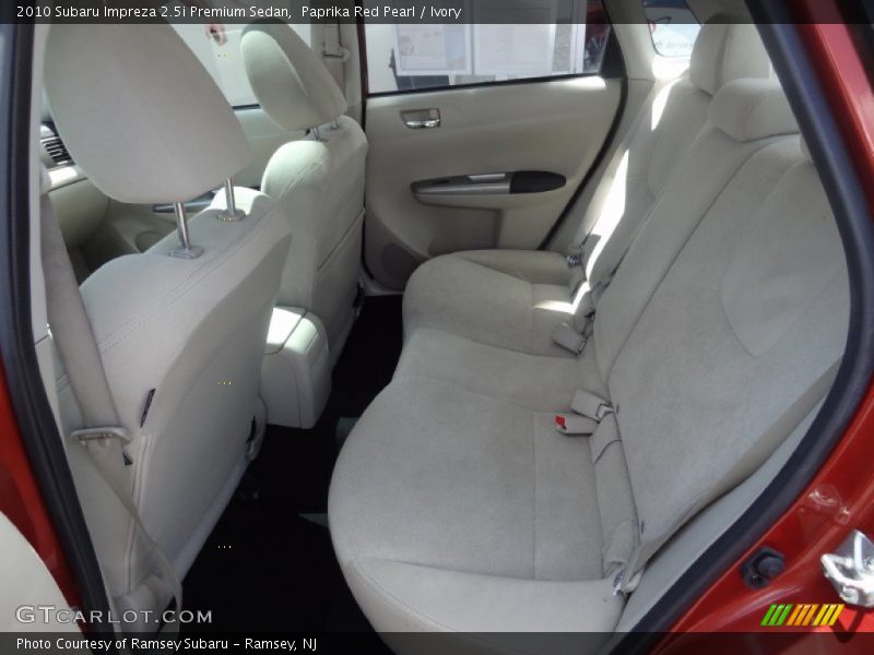 Paprika Red Pearl / Ivory 2010 Subaru Impreza 2.5i Premium Sedan