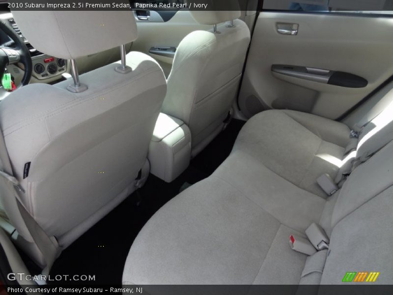 Paprika Red Pearl / Ivory 2010 Subaru Impreza 2.5i Premium Sedan