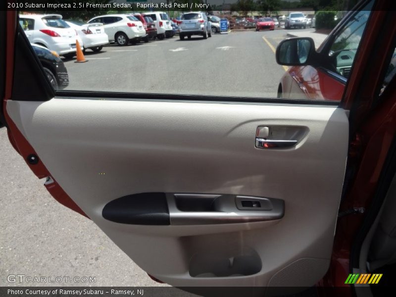 Paprika Red Pearl / Ivory 2010 Subaru Impreza 2.5i Premium Sedan