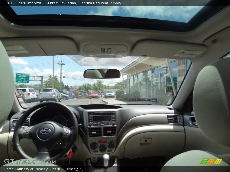 Paprika Red Pearl / Ivory 2010 Subaru Impreza 2.5i Premium Sedan