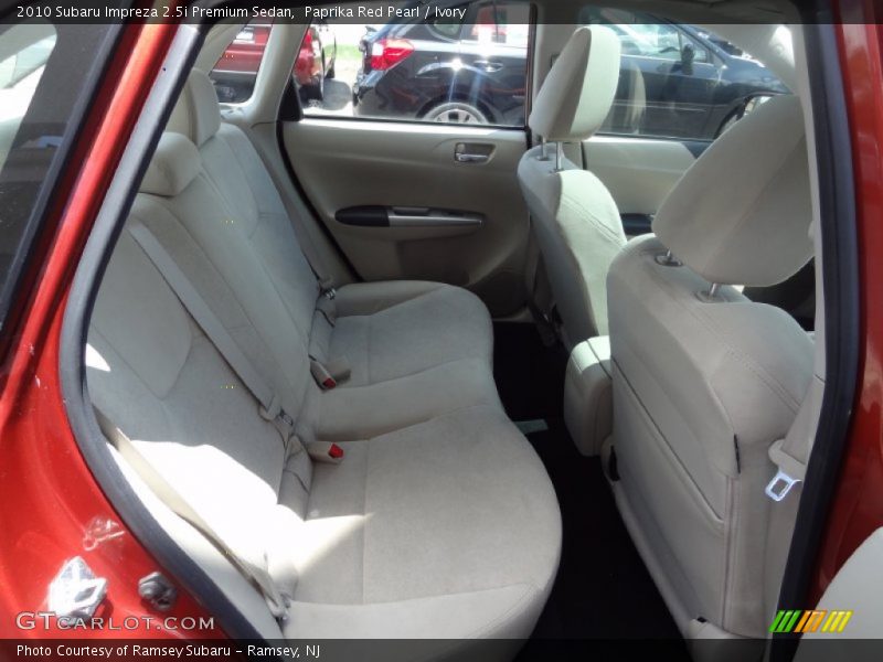 Paprika Red Pearl / Ivory 2010 Subaru Impreza 2.5i Premium Sedan