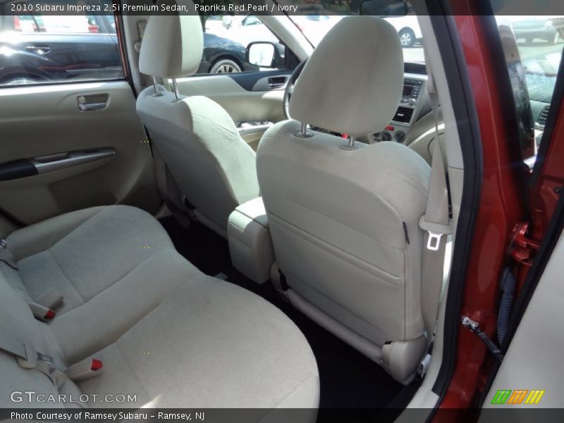Paprika Red Pearl / Ivory 2010 Subaru Impreza 2.5i Premium Sedan