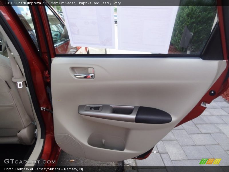 Paprika Red Pearl / Ivory 2010 Subaru Impreza 2.5i Premium Sedan