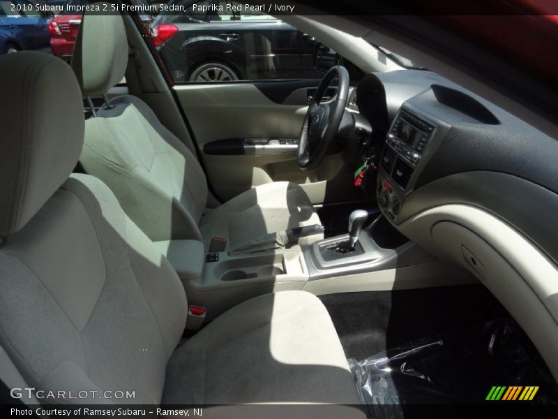 Paprika Red Pearl / Ivory 2010 Subaru Impreza 2.5i Premium Sedan