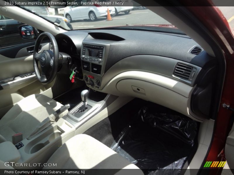 Paprika Red Pearl / Ivory 2010 Subaru Impreza 2.5i Premium Sedan