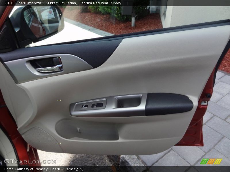 Paprika Red Pearl / Ivory 2010 Subaru Impreza 2.5i Premium Sedan