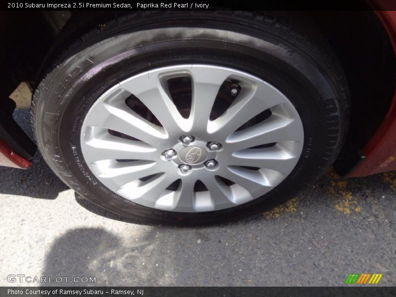Paprika Red Pearl / Ivory 2010 Subaru Impreza 2.5i Premium Sedan