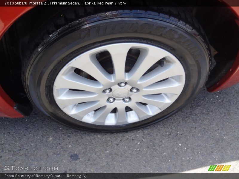Paprika Red Pearl / Ivory 2010 Subaru Impreza 2.5i Premium Sedan