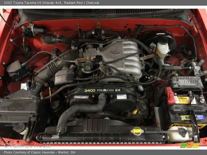 Radiant Red / Charcoal 2002 Toyota Tacoma V6 Xtracab 4x4