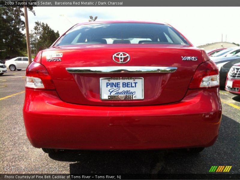 Barcelona Red Metallic / Dark Charcoal 2009 Toyota Yaris S Sedan