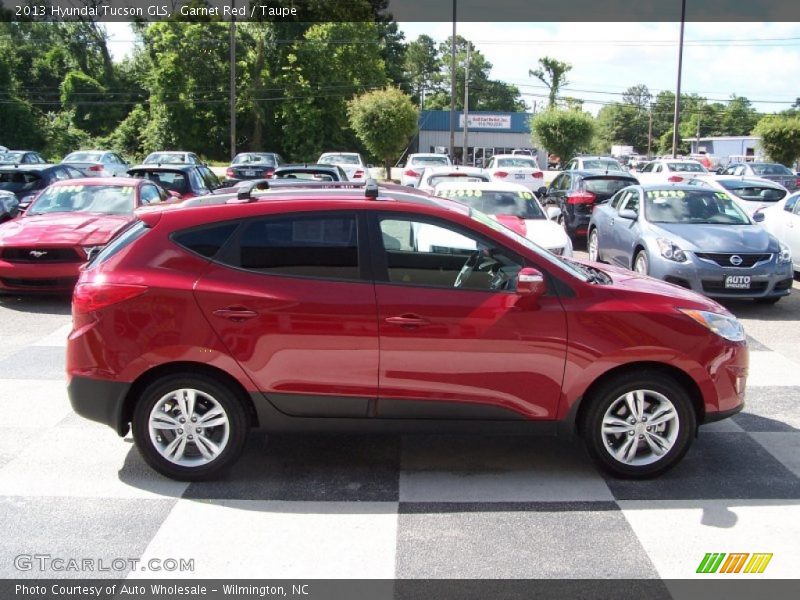 Garnet Red / Taupe 2013 Hyundai Tucson GLS