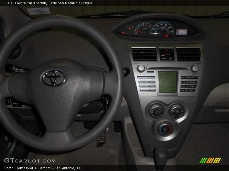 Jade Sea Metallic / Bisque 2010 Toyota Yaris Sedan