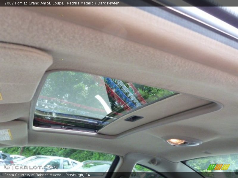 Redfire Metallic / Dark Pewter 2002 Pontiac Grand Am SE Coupe