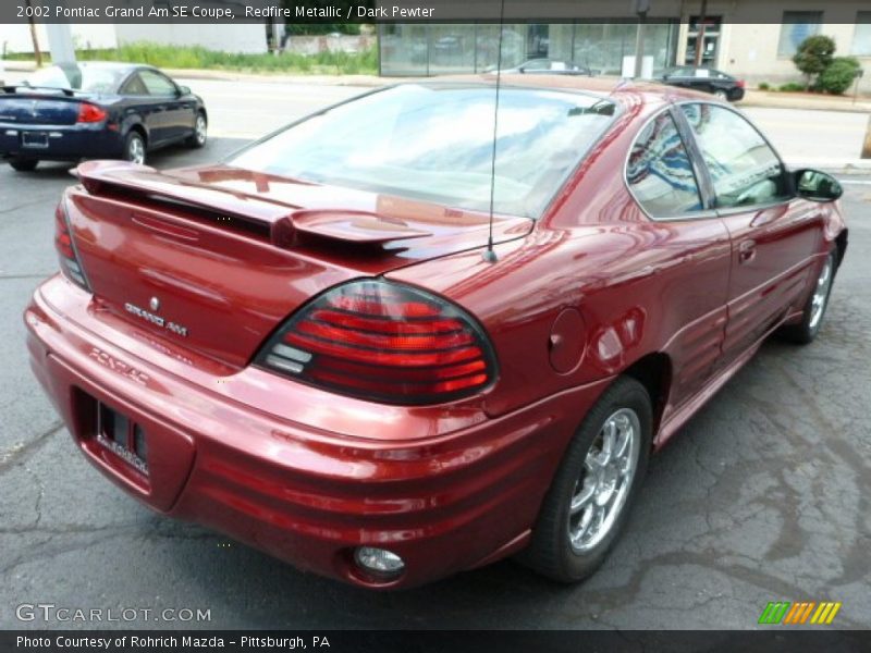 Redfire Metallic / Dark Pewter 2002 Pontiac Grand Am SE Coupe