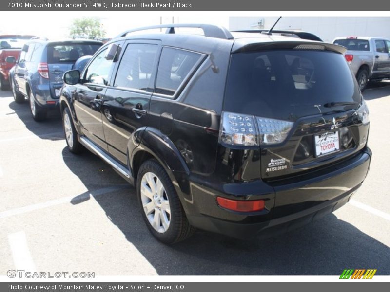 Labrador Black Pearl / Black 2010 Mitsubishi Outlander SE 4WD