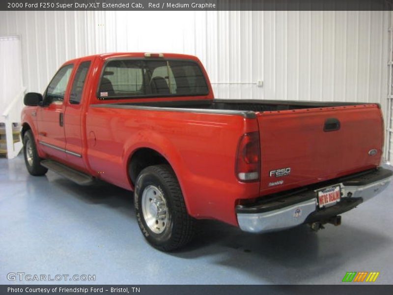 Red / Medium Graphite 2000 Ford F250 Super Duty XLT Extended Cab