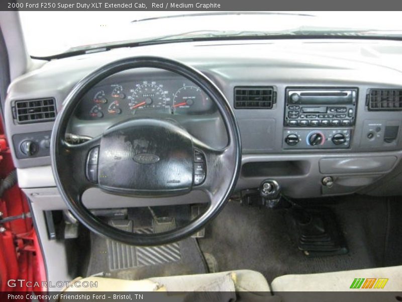 Red / Medium Graphite 2000 Ford F250 Super Duty XLT Extended Cab