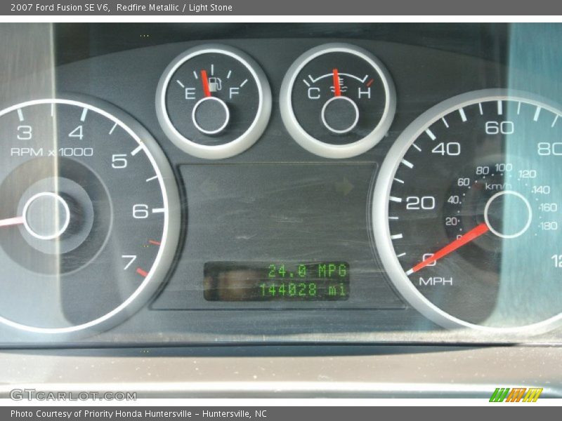 Redfire Metallic / Light Stone 2007 Ford Fusion SE V6