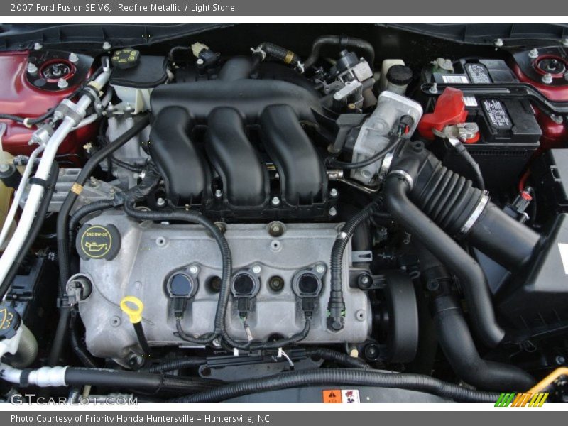 Redfire Metallic / Light Stone 2007 Ford Fusion SE V6