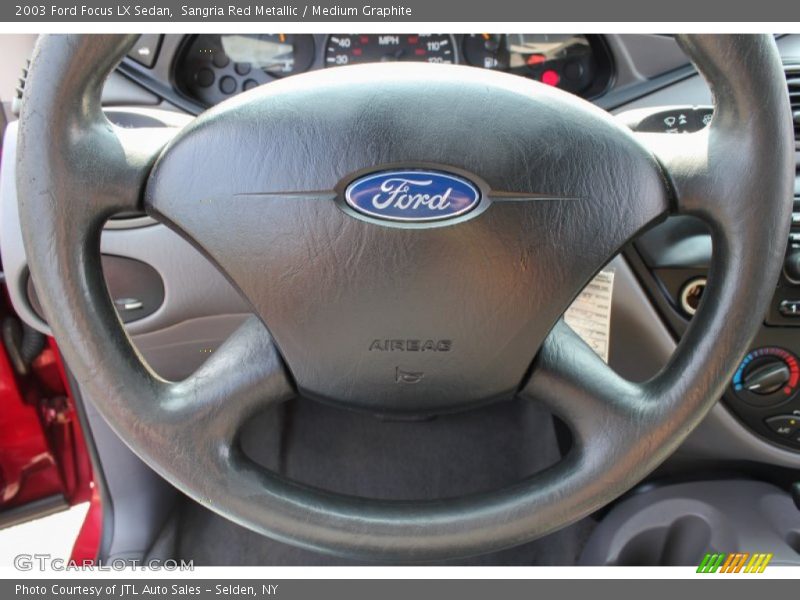 Sangria Red Metallic / Medium Graphite 2003 Ford Focus LX Sedan