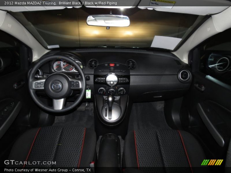 Dashboard of 2012 MAZDA2 Touring