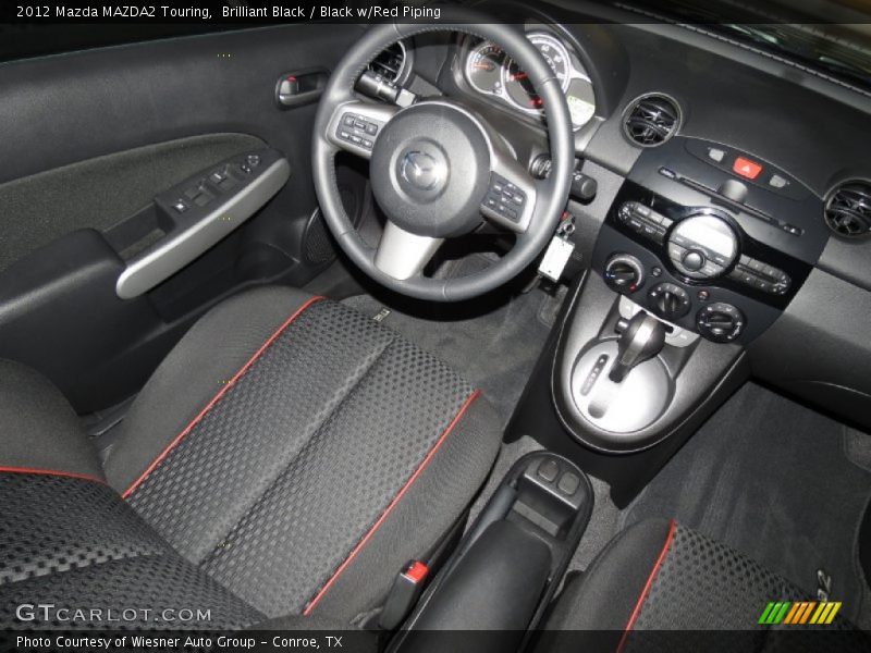 Dashboard of 2012 MAZDA2 Touring