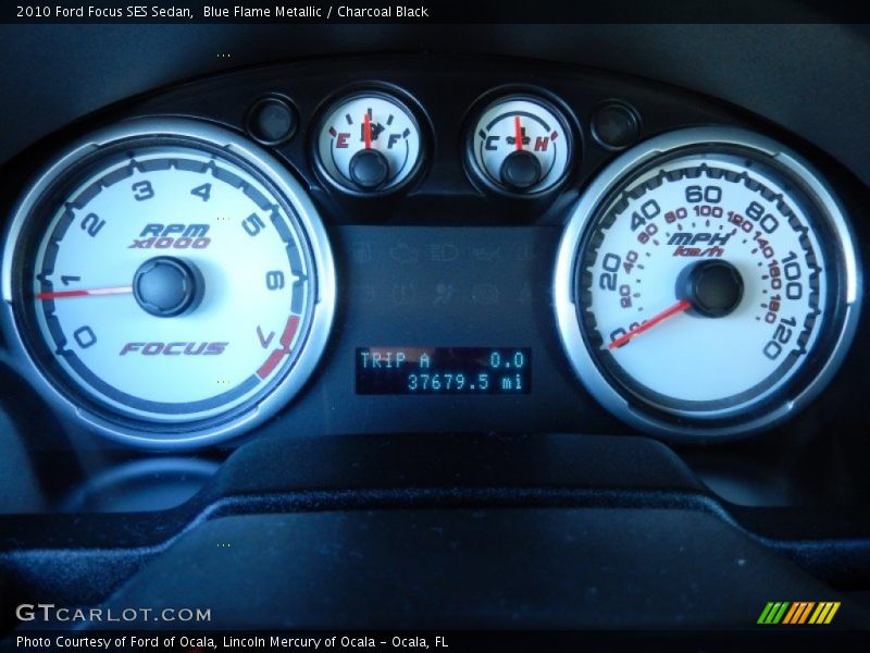 Blue Flame Metallic / Charcoal Black 2010 Ford Focus SES Sedan