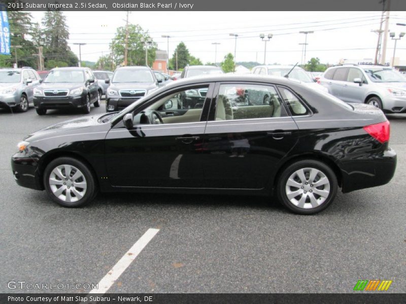 Obsidian Black Pearl / Ivory 2011 Subaru Impreza 2.5i Sedan