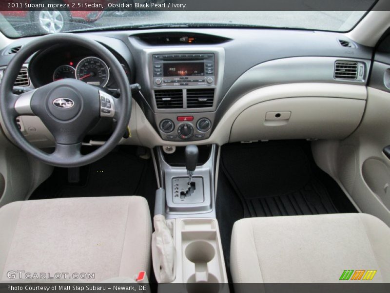 Obsidian Black Pearl / Ivory 2011 Subaru Impreza 2.5i Sedan