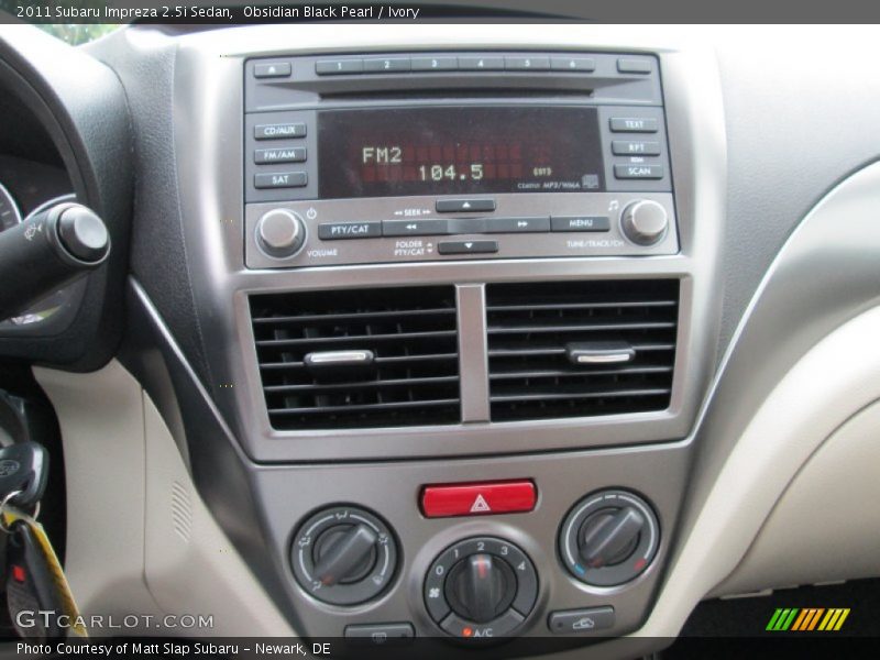 Obsidian Black Pearl / Ivory 2011 Subaru Impreza 2.5i Sedan